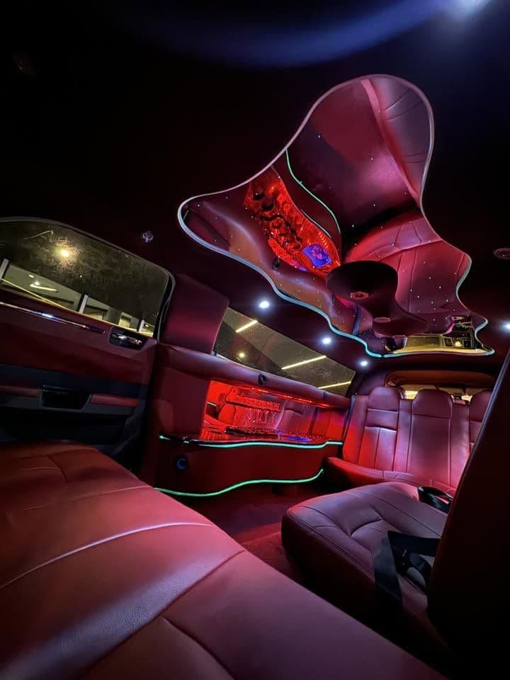 Inside the Rolls Royce Tribute limousine — leather seating and mood lighting