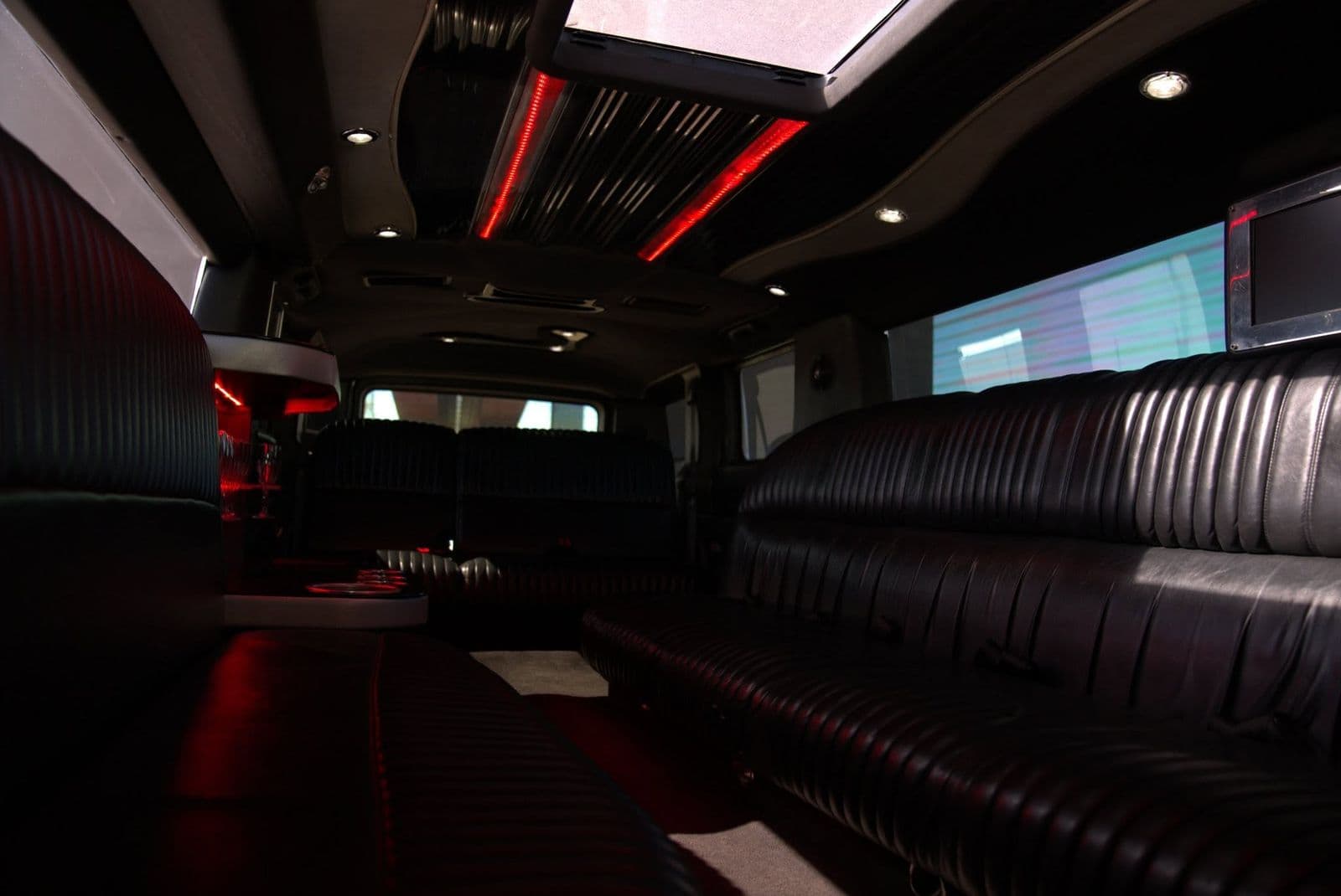 Inside the white Hummer limousine — leather lounge seating