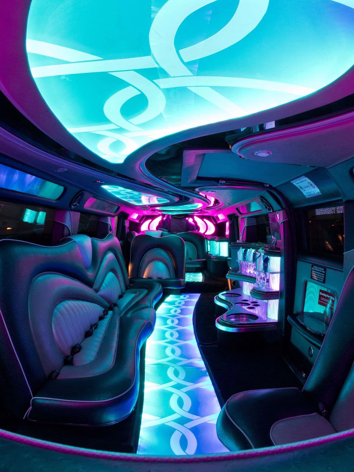 Inside the Hummer 6x6 — lounge seating, LED ceiling and lit floor