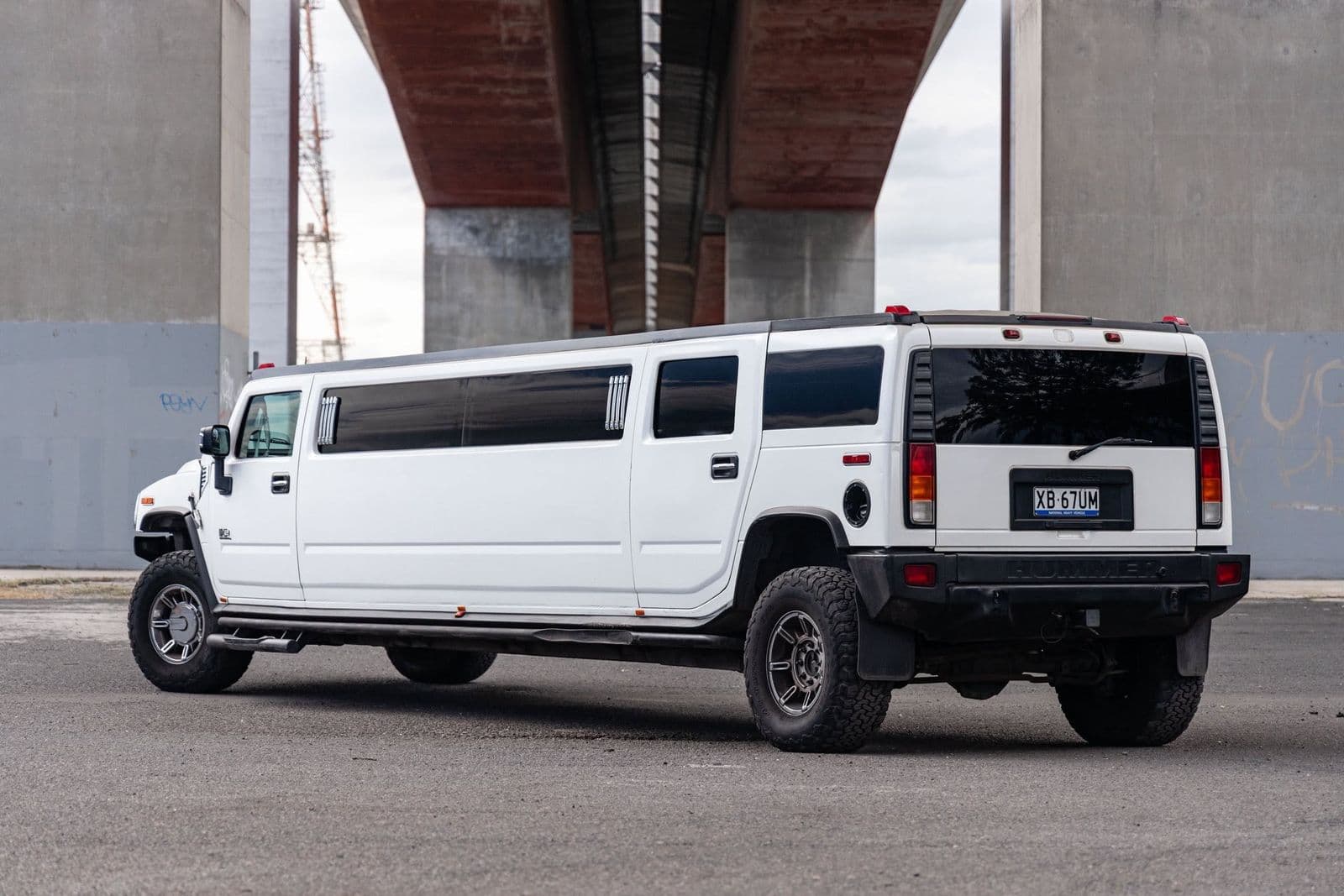 Rear of the white Hummer limousine under the Bolte Bridge